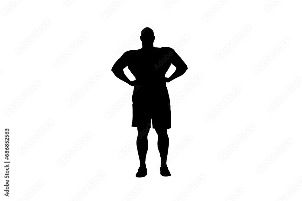 In the shot, a man stands in silhouette against a white background. He is an athlete, bodybuilder, bodybuilder. Demonstrates his body, biceps and muscles. He looks at the camera with his arms folded