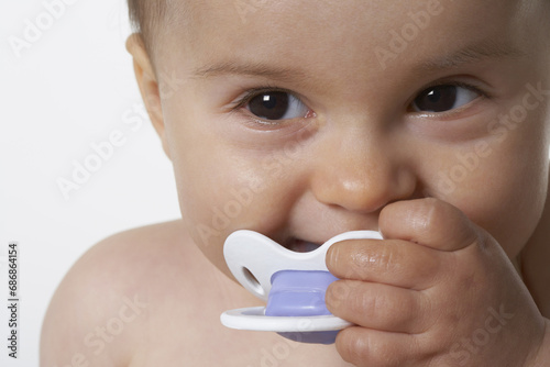 Portrait of Baby with Pacifier photo