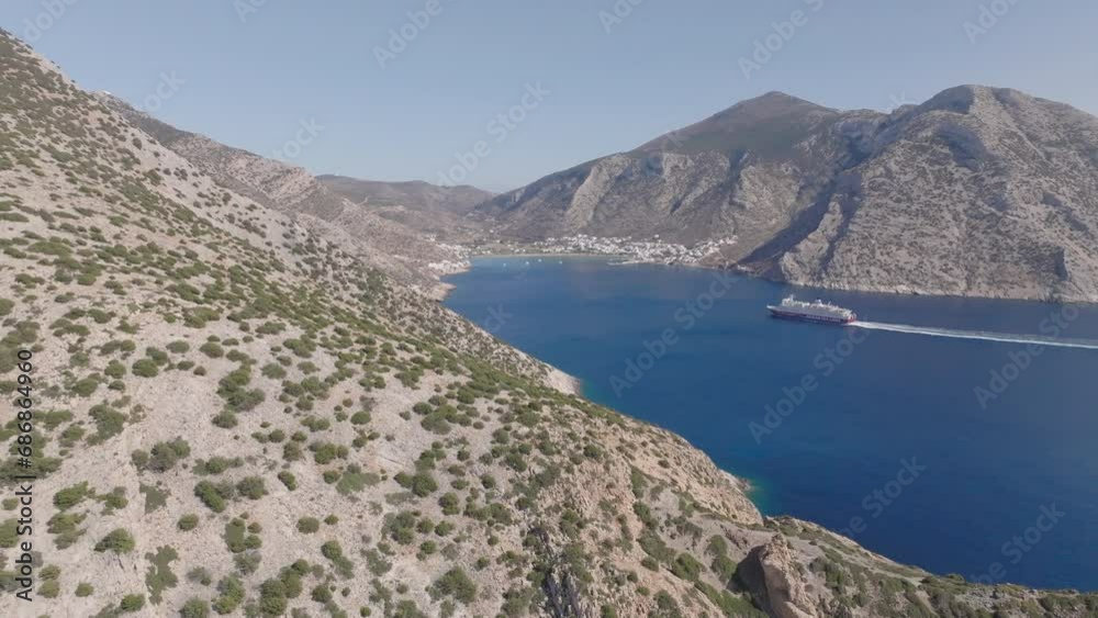 A ferry entering the bay of Kamares, on the island of Sifnos in Greece A ferry entering the bay of Kamares, on the island of Sifnos in Greece