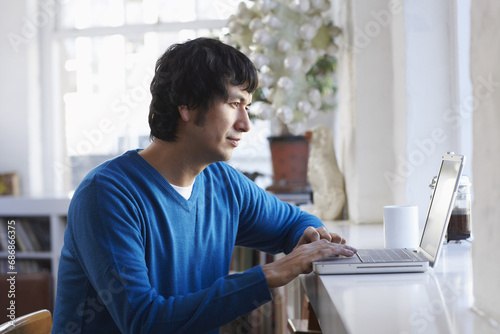 Man Using Laptop Computer