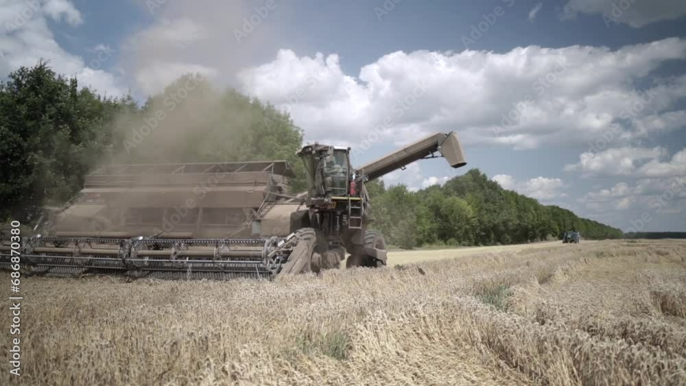 Futuristic Combine Harvester harvesting wheat Futuristic Combine Harvester harvesting wheat