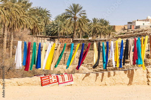 Colorful cloths hanging from a line in a Tunisian village.