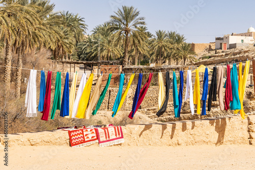 Εκτύπωση καμβά Colorful cloths hanging from a line in a Tunisian village.