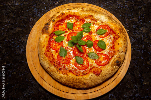 Traditional Italian vera Margherita pizza with mozzarella and basil isolated 