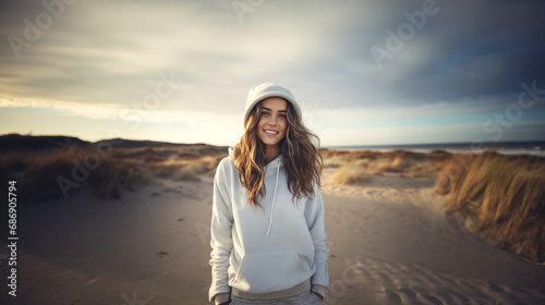 smiling woman in white hood...