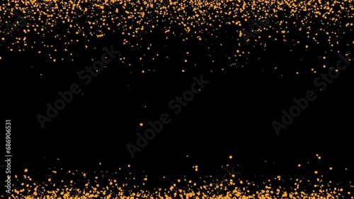 Gold particles are sprayed from below and above and disappear in a random order. photo