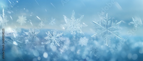 Crystal snowflakes on frosty winter background with soft focus. Seasonal weather patterns.