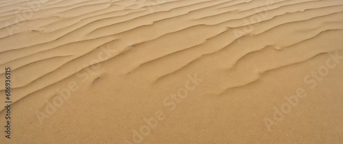 sandy beach background © Tan