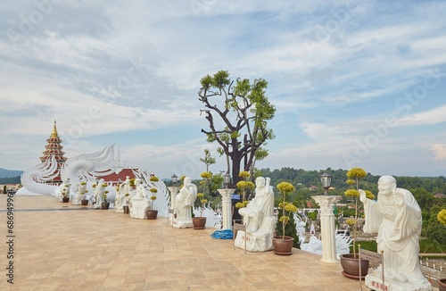 The stunning Wat Huai Pla Klang temple in Chiang Rai Province, Thailand photo