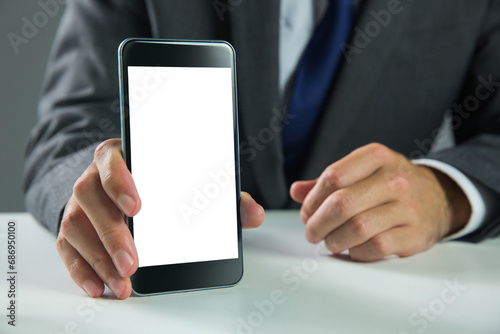 Digital png photo of hand of caucasian businessman with smartphone on transparent background