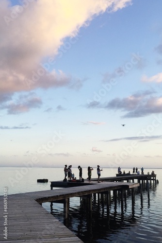 Beautiful dock in the sunset over the ocean in Tahiti 