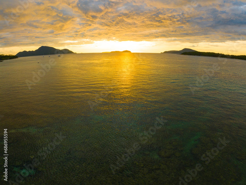 Amazing sunset or sunrise sky over sea landscape,Beautiful colorful light of nature seascape background,Drone aerial view ocean background