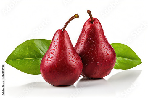 Ripe red pear fruits with green leaves and water droplets isolated on white background