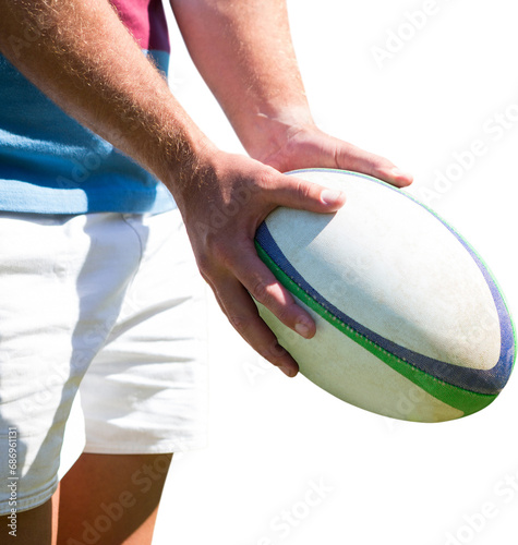 Digital png photo of hands of rugby player holding ball on transparent background