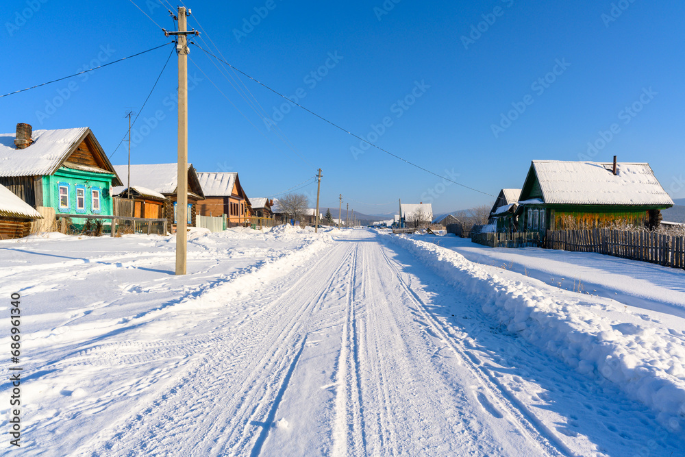 Winter snowy village in the Ural mountains.