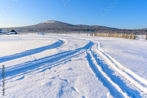 Winter snowy village in the Ural mountains. © Evgeniy