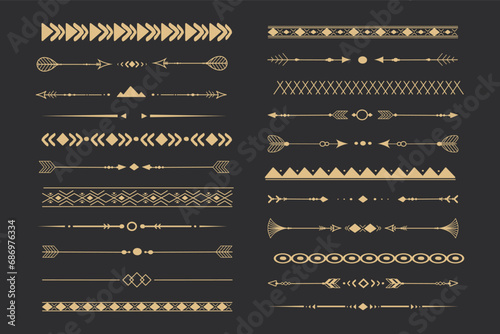 Set tribal golden ethnic arrow dividers, native indian bow boho in doodle style isolated on dark background. Collection borders, decoration elements photo