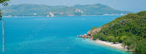 Viewpoint over Ko Kham Island Sattahip Chonburi Thailand a tropical island with turqouse colored ocen, you can reach the viewpoint after a short hike in the jungle