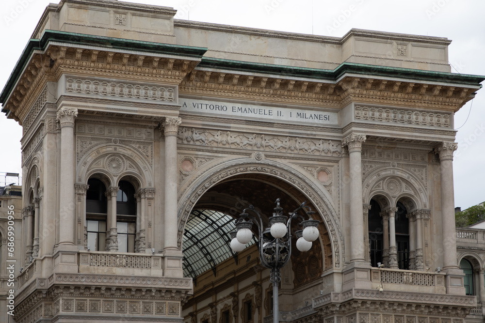 Galleria Vittorio Emanuele II entrance facade in Milan city in Italy
