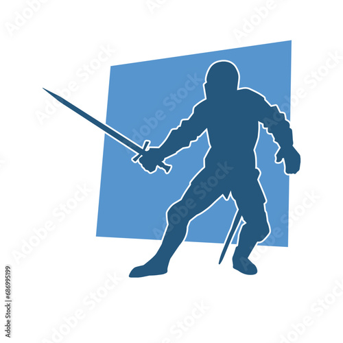 Silhouette of a male warrior wearing war armor suit in action pose using a sword weapon.