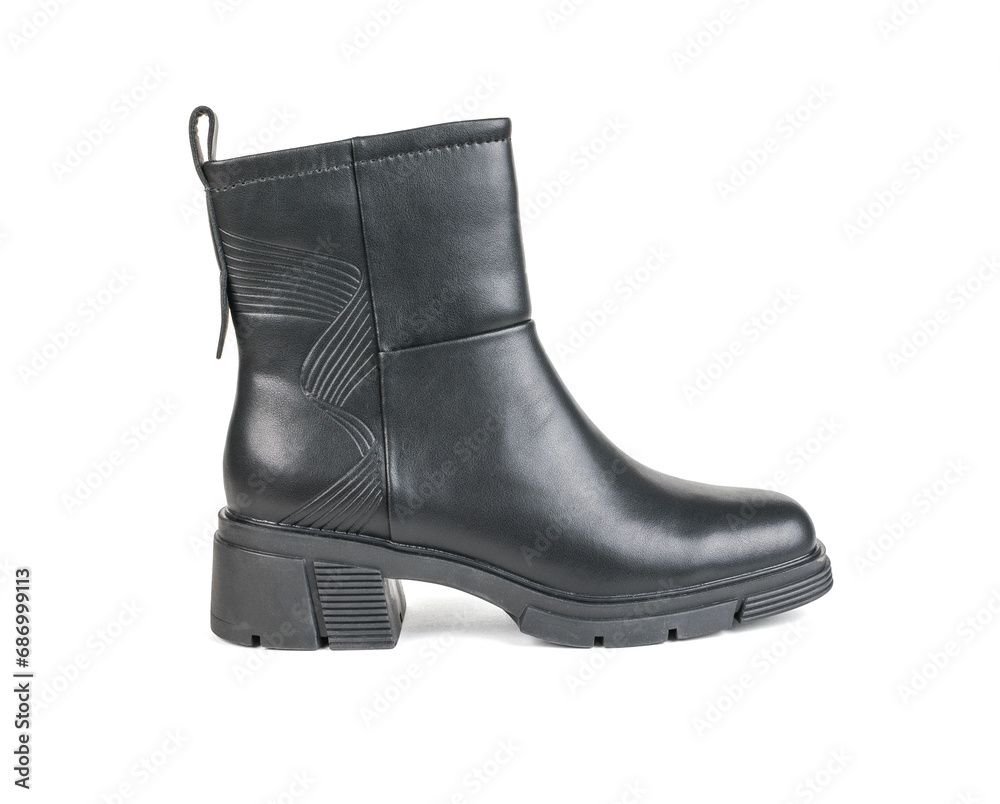 Elegant women's black ankle boots isolated on a white background.