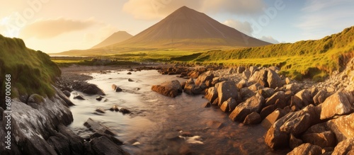 On Irelands spectacular West Coast, nestled in the heart of nature, lies Croagh Patrick, a majestic mountain adorned with lush vegetation and rugged rocks. Its towering peak beckons adventurers and