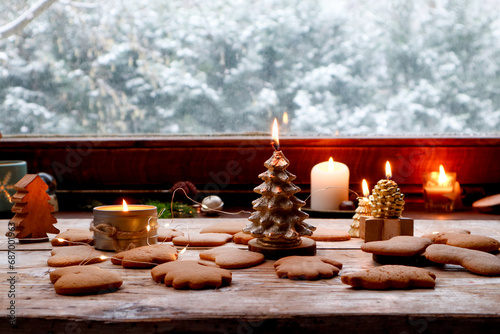 Festive Candles Burning by a Snow-Laden Window