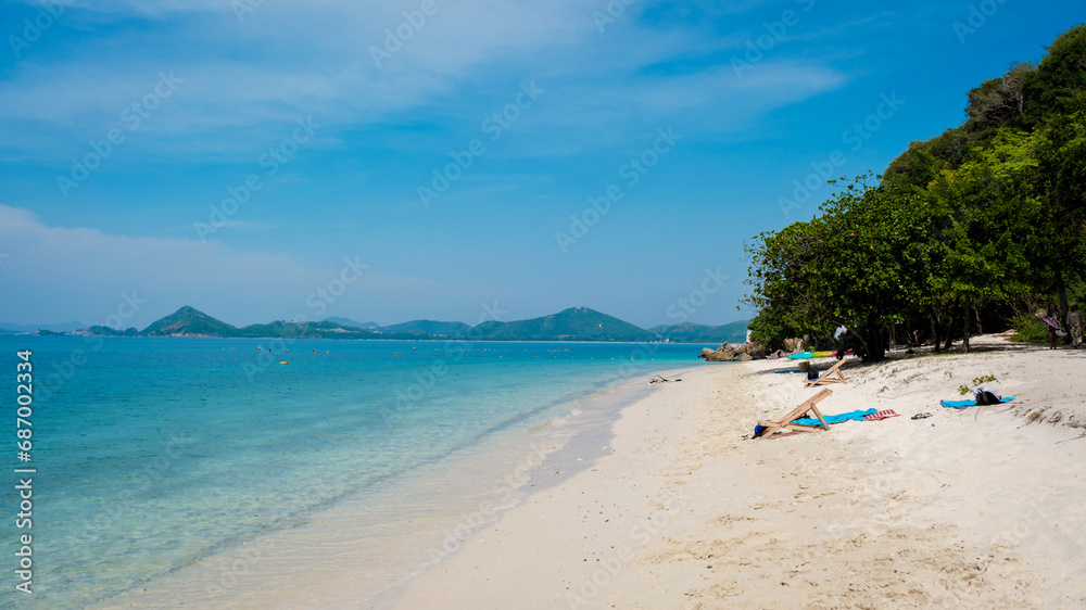 a white tropical beach at Ko Kham Island Sattahip Chonburi Samaesan Thailand, a tropical island with turqouse colored ocen