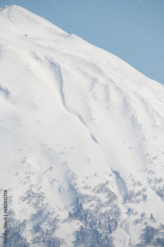 Summit of snow covered Mount Yotei volcano, Niseko