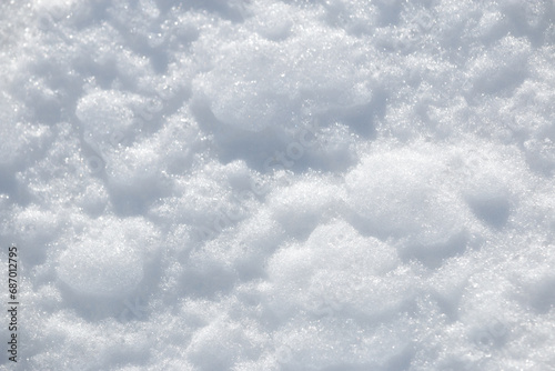 Natural frozen white winter snow rough texture abstract background pattern © Alexandra Scotcher