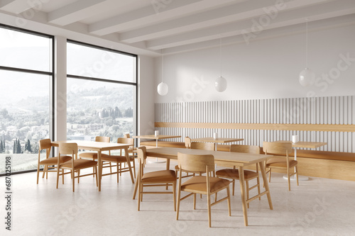 Stylish cafe interior with woodden table and seats, eating corner near window © ImageFlow