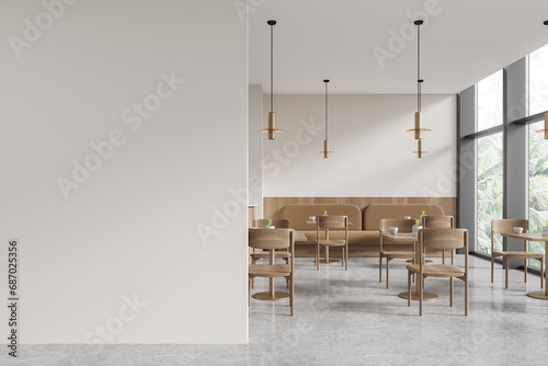 Modern cafe interior with dining table and chairs, window. Mock up wall