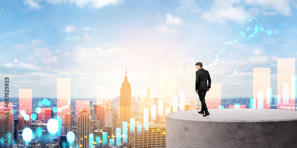 Man looking at financial graphs in city sky Man looking at financial graphs in city sky