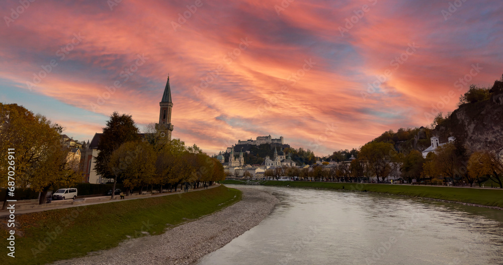 Autumn season at a historic city of Salzburg with Salzach river in beautiful sunset sky and colorful of autumn scene Salzburger Land, Austria