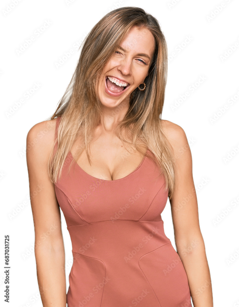 Beautiful caucasian woman wearing casual clothes winking looking at the camera with sexy expression, cheerful and happy face. Beautiful caucasian woman wearing casual clothes winking looking at the camera with sexy expression, cheerful and happy face.
