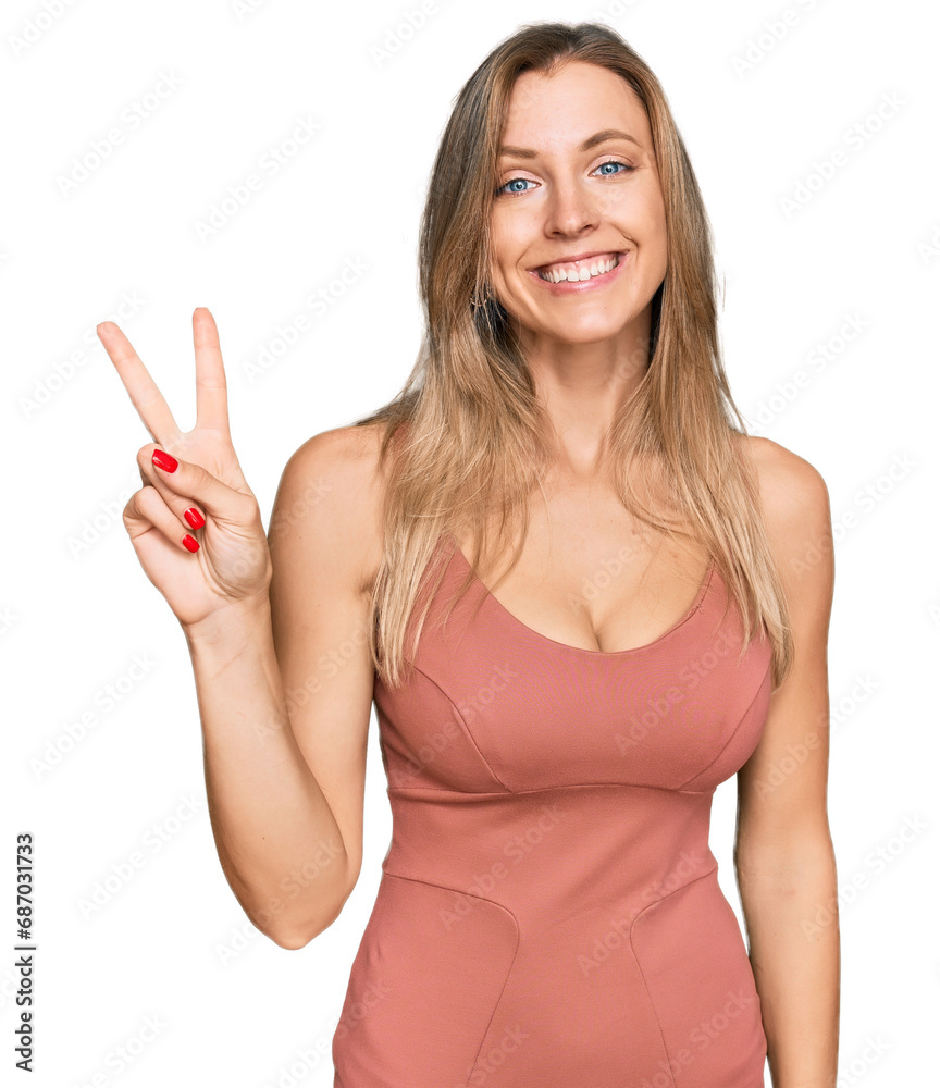 Beautiful caucasian woman wearing casual clothes showing and pointing up with fingers number two while smiling confident and happy. Beautiful caucasian woman wearing casual clothes showing and pointing up with fingers number two while smiling confident and happy.