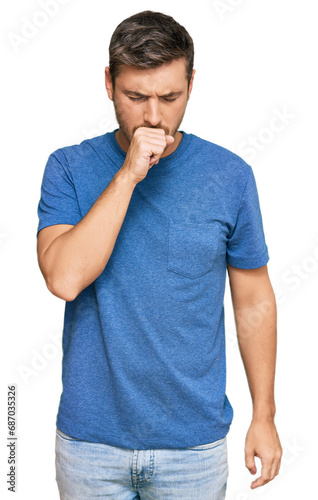 Handsome caucasian man wearing casual clothes feeling unwell and coughing as symptom for cold or bronchitis. health care concept.
