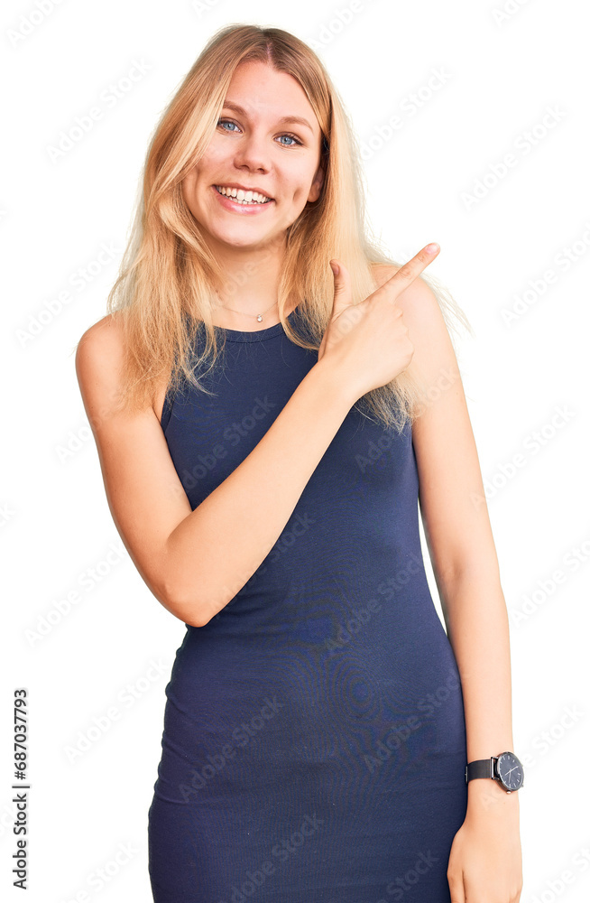 Young beautiful blonde woman wearing casual dress cheerful with a smile of face pointing with hand and finger up to the side with happy and natural expression on face Young beautiful blonde woman wearing casual dress cheerful with a smile of face pointing with hand and finger up to the side with happy and natural expression on face