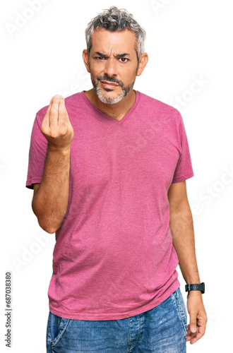 Middle age grey-haired man wearing casual clothes doing italian gesture with hand and fingers confident expression