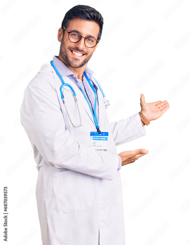 Young hispanic man wearing doctor uniform and stethoscope inviting to enter smiling natural with open hand Young hispanic man wearing doctor uniform and stethoscope inviting to enter smiling natural with open hand