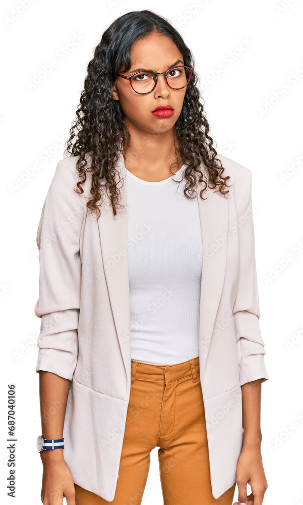 Young african american girl wearing business clothes skeptic and nervous, frowning upset because of problem. negative person. Young african american girl wearing business clothes skeptic and nervous, frowning upset because of problem. negative person.