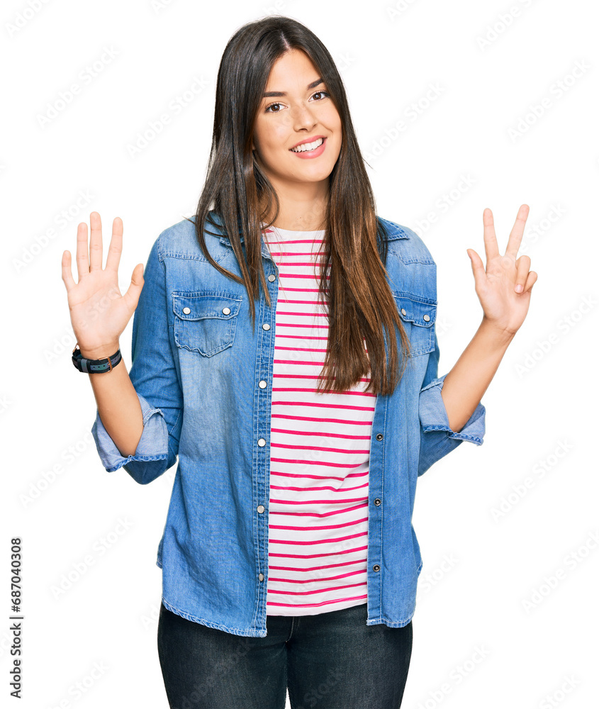 Young brunette woman wearing casual clothes showing and pointing up with fingers number eight while smiling confident and happy. Young brunette woman wearing casual clothes showing and pointing up with fingers number eight while smiling confident and happy.