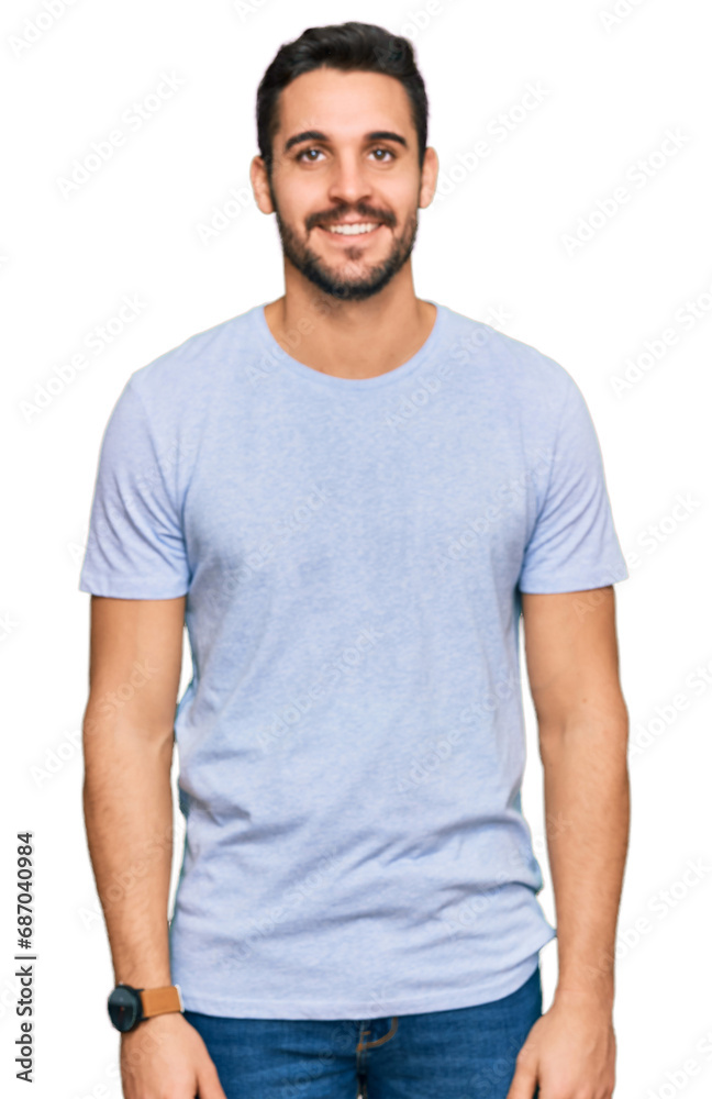 Obraz premium Young hispanic man wearing casual clothes with a happy and cool smile on face. lucky person.