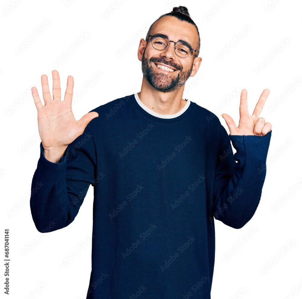 Hispanic man with ponytail wearing casual sweater and glasses showing and pointing up with fingers number eight while smiling confident and happy. Hispanic man with ponytail wearing casual sweater and glasses showing and pointing up with fingers number eight while smiling confident and happy.