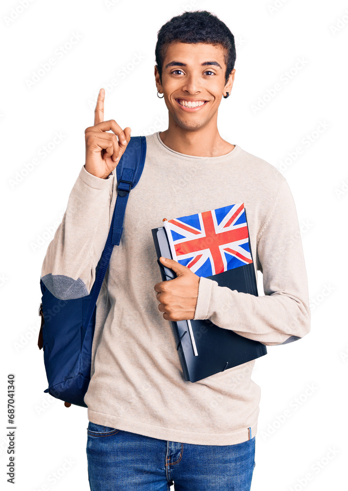 Young african amercian man wearing student backpack holding binder and uk flag surprised with an idea or question pointing finger with happy face, number one Young african amercian man wearing student backpack holding binder and uk flag surprised with an idea or question pointing finger with happy face, number one