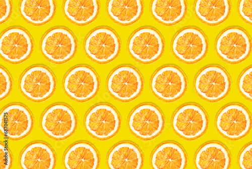 Dry orange slices background. Orange fruit cut texture. Red orange cross section pattern. Vibrant color christmas design. Flat lay fruits.