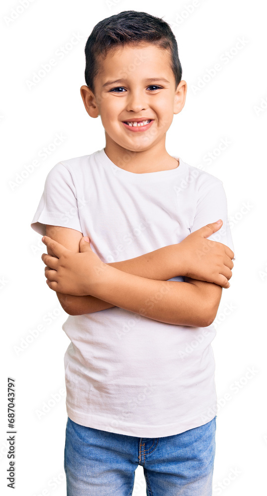 Little cute boy kid wearing casual white tshirt happy face smiling with crossed arms looking at the camera. positive person. Little cute boy kid wearing casual white tshirt happy face smiling with crossed arms looking at the camera. positive person.