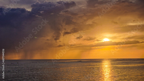 Sunset and a storm in the Pacific Ocean 