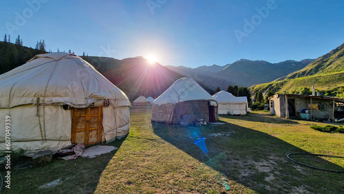 Sunrise over the yurts in Kyrgyzstan © pop_gino