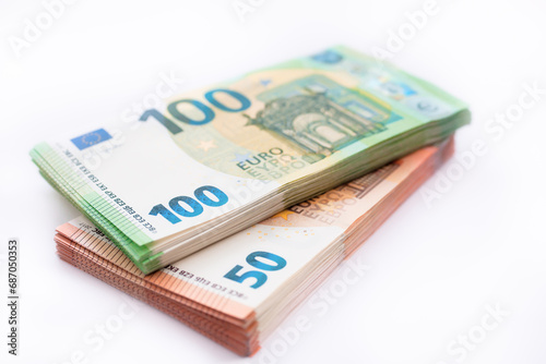 Cash euro bills on white background, money